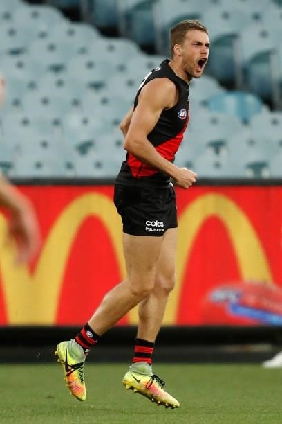 Tom Cutler of the Bombers celebrates a goal during the round 20 AFL match between Essendon Bombers and Sydney Swans at Melbourne Cricket Ground on...