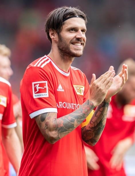 Christopher Trimmel of 1.FC Union Berlin celebrates with his fans after winning the pre-season friendly match between 1. FC Union Berlin and Athletic...