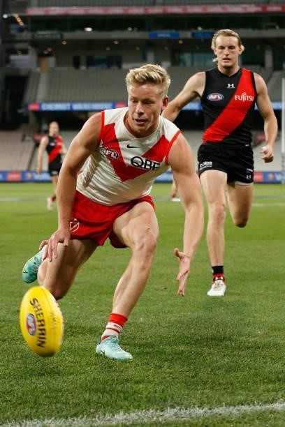 Isaac Heeney of the Swans chases the ball during the round 20 AFL match between Essendon Bombers and Sydney Swans at Melbourne Cricket Ground on...