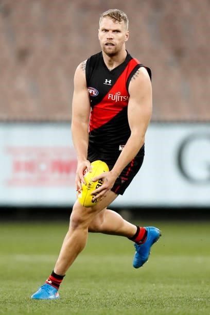 Jake Stringer of the Bombers runs with the ball during the round 20 AFL match between Essendon Bombers and Sydney Swans at Melbourne Cricket Ground...