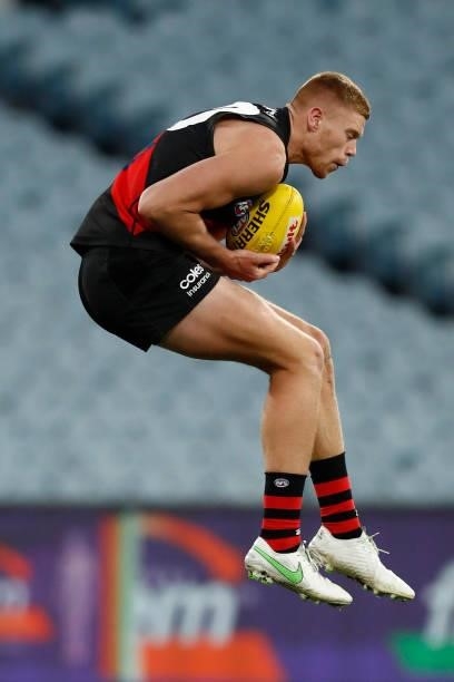 Peter Wright of the Bombers marks the ball during the round 20 AFL match between Essendon Bombers and Sydney Swans at Melbourne Cricket Ground on...