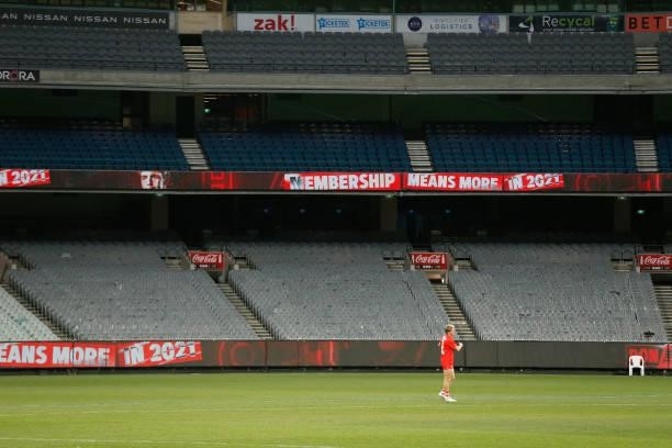 Medical sub Dylan Stephens of the Swans runs sprints after the round 20 AFL match between Essendon Bombers and Sydney Swans at Melbourne Cricket...
