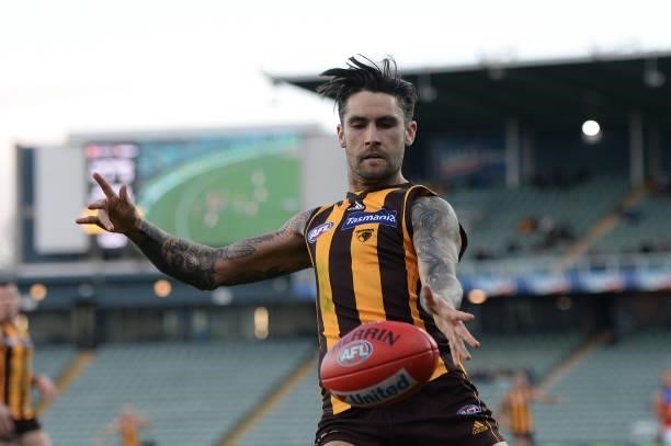 Chad Wingard of the Hawks kicks the ball during the round 19 AFL match between Hawthorn Hawks and Brisbane Lions at University of Tasmania Stadium on...