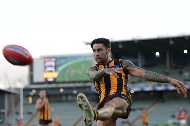 Chad Wingard of the Hawks kicks the ball during the round 19 AFL match between Hawthorn Hawks and Brisbane Lions at University of Tasmania Stadium on...