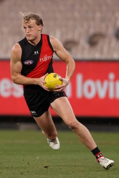 Mason Redman of the Bombers in action during the round 20 AFL match between Essendon Bombers and Sydney Swans at Melbourne Cricket Ground on August...