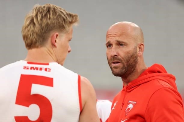 Sydney Swans Assistant Coach Jarrad McVeigh is seen talking to Isaac Heeney during the round 20 AFL match between Essendon Bombers and Sydney Swans...