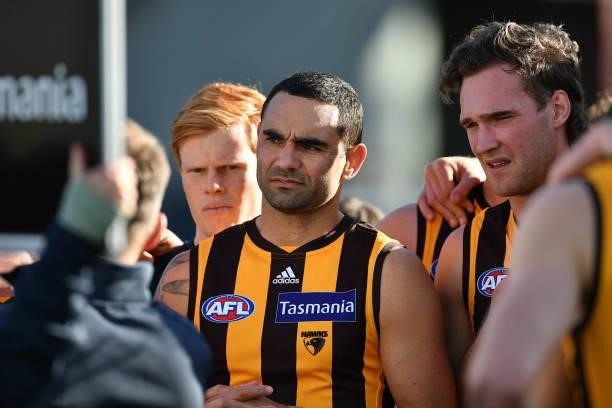 Shaun Burgoyne and Jack Scrimshaw of the Hawks listen instructions during the round 19 AFL match between Hawthorn Hawks and Brisbane Lions at...