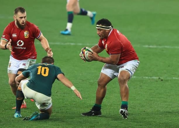 Mako Vunipola of the Lions goes past Handre Pollard during the 2nd test match between South Africa Springboks and the British & Irish Lions at Cape...