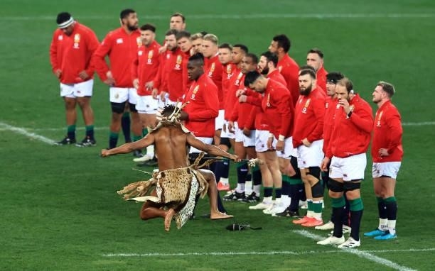 The British & Irish Lions team are challenged by a Zulu warrior prior to the 2nd test match between South Africa Springboks and the British & Irish...