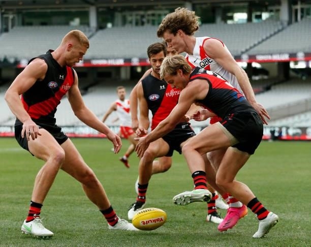 Darcy Parish of the Bombers and Nick Blakey of the Swans compete for the ball during the round 20 AFL match between Essendon Bombers and Sydney Swans...