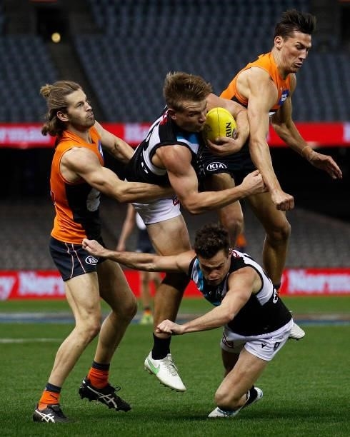 Ollie Wines of the Power takes a high contested mark during the round 20 AFL match between Greater Western Sydney Giants and Port Adelaide Power at...