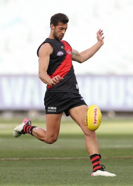 Kyle Langford of the Bombers kicks for goal during the round 20 AFL match between Essendon Bombers and Sydney Swans at Melbourne Cricket Ground on...