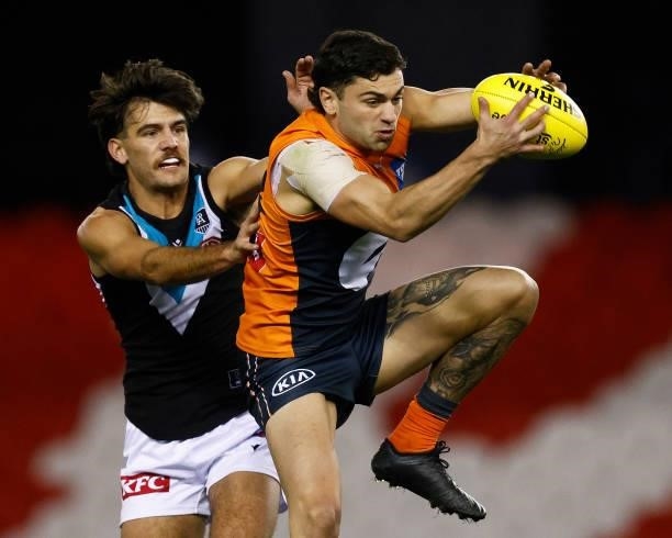 Tim Taranto of the Giants marks the ball during the round 20 AFL match between Greater Western Sydney Giants and Port Adelaide Power at Marvel...