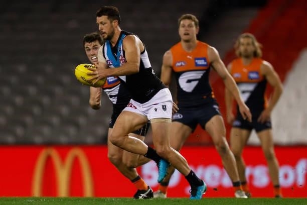 Travis Boak of the Power runs with the ball during the round 20 AFL match between Greater Western Sydney Giants and Port Adelaide Power at Marvel...