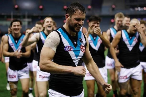 Travis Boak of the Power leads the team off the field after winning the round 20 AFL match between Greater Western Sydney Giants and Port Adelaide...
