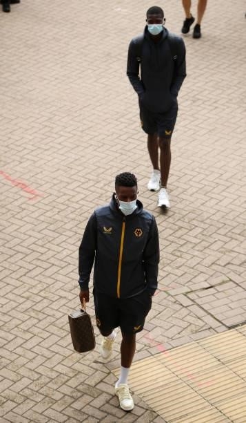 Nelson Semedo of Wolverhampton Wanderers is seen wearing a face mask as he arrives at the stadium prior to the Pre-Season friendly match between...