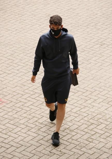 Christian Marques of Wolverhampton Wanderers is seen wearing a face mask as he arrives at the stadium prior to the Pre-Season friendly match between...
