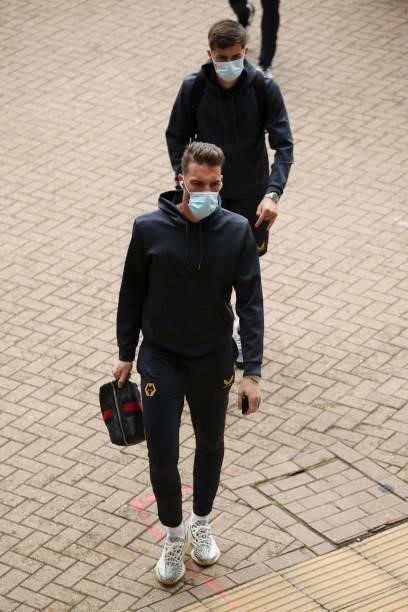 Jose Sa of Wolverhampton Wanderers is seen wearing a face mask as he arrives at the stadium prior to the Pre-Season friendly match between Coventry...
