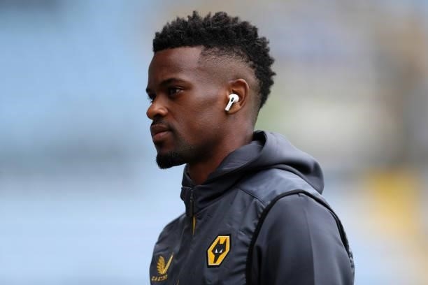 Nelson Semedo of Wolverhampton Wanderers reacts as he inspects the pitch prior to the Pre-Season friendly match between Coventry City and...