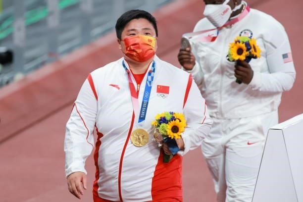 Gold medalist Gong Lijiao of China celebrates during the medal ceremony for the Women's Shot Put Final on day nine of the Tokyo 2020 Olympic Games at...