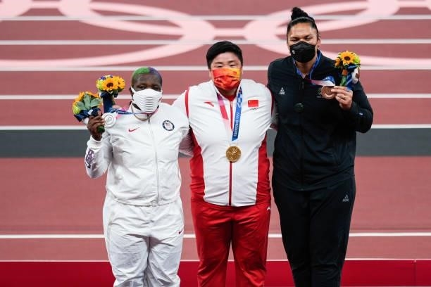 Silver medalist Raven Saunders of United States, gold medalist Gong Lijiao of China and bronze medalist Valerie Adams of New Zealand pose on the...