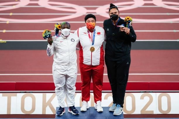 Silver medalist Raven Saunders of United States, gold medalist Gong Lijiao of China and bronze medalist Valerie Adams of New Zealand pose on the...