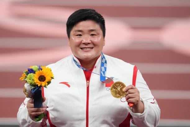 Gold medalist Gong Lijiao of China poses on the podium during the medal ceremony for the Women's Shot Put Final on day nine of the Tokyo 2020 Olympic...