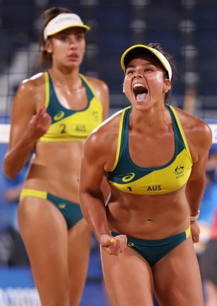 Mariafe Artacho del Solar and Taliqua Clancy of Team Australia react as they compete against Team China during the Women's Round of 16 beach...