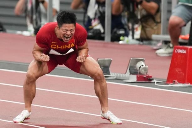 Su Bingtian of China celebrates after winning the Men's 100m Semi-Final on day nine of the Tokyo 2020 Olympic Games at Olympic Stadium on August 1,...