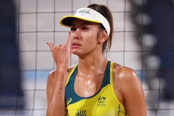 Taliqua Clancy of Team Australia reacts as she competes against Team China during the Women's Round of 16 beach volleyball on day nine of the Tokyo...