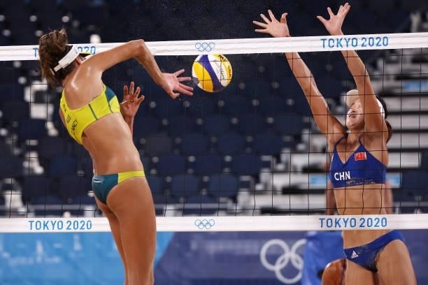 Taliqua Clancy of Team Australia competes against Xinxin Wang of Team China during the Women's Round of 16 beach volleyball on day nine of the Tokyo...
