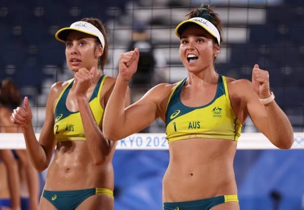 Mariafe Artacho del Solar and Taliqua Clancy of Team Australia react after they defeated Team China during the Women's Round of 16 beach volleyball...