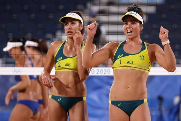 Mariafe Artacho del Solar and Taliqua Clancy of Team Australia react after they defeated Team China during the Women's Round of 16 beach volleyball...