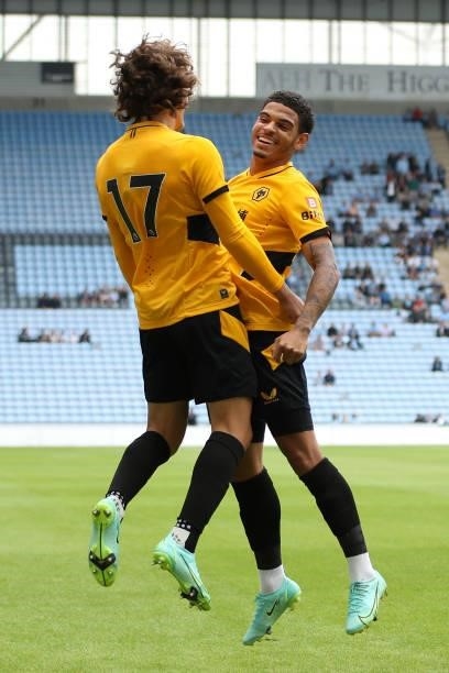 Fabio Silva of Wolverhampton Wanderers celebrates with Morgan Gibbs-White after scoring their side's first goal during the Pre-Season friendly match...