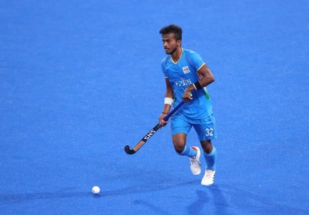 Vivek Sagar Prasad of Team India runs with the ball during the Men's Quarterfinal match between India and Great Britain on day nine of the Tokyo 2020...