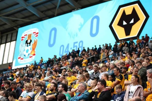 Fans of Wolverhampton Wanderers show their support during the Pre-Season friendly match between Coventry City and Wolverhampton Wanderers at Ricoh...