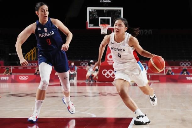 Jihyun Park of Team South Korea drives to the basket against Jelena Brooks of Team Serbia during the first half of a Women's Basketball Preliminary...