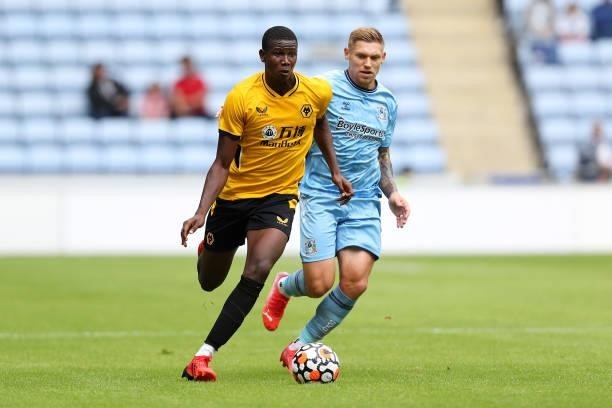 Yerson Mosquera of Wolverhampton Wanderers runs with the ball during the Pre-Season friendly match between Coventry City and Wolverhampton Wanderers...