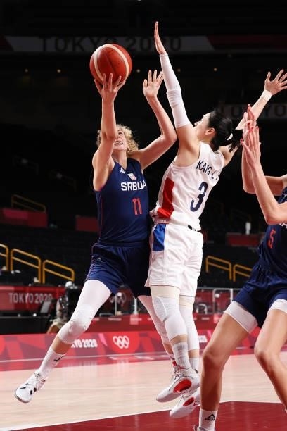 Aleksandra Crvendakic of Team Serbia drives to the basket against Leeseul Kang of Team South Korea during the second half of a Women's Basketball...