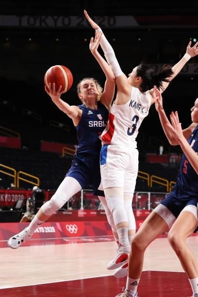 Aleksandra Crvendakic of Team Serbia drives to the basket against Leeseul Kang of Team South Korea during the second half of a Women's Basketball...