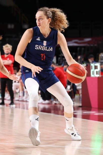 Aleksandra Crvendakic of Team Serbia drives to the basket against Team Serbia during the second half of a Women's Basketball Preliminary Round Group...