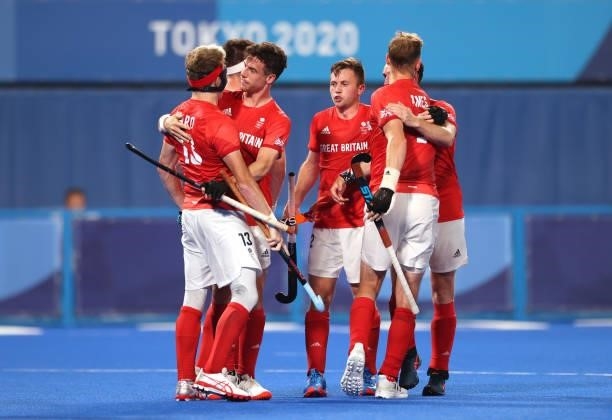 Samuel Ian Ward of Team Great Britain celebrates with teammate Phillip Roper after scoring their team's first goal during the Men's Quarterfinal...