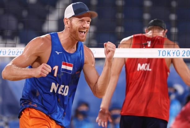 Alexander Brouwer of Team Netherlands reacts against Anders Berntsen Mol of Team Norway during the Men's Round of 16 beach volleyball on day nine of...
