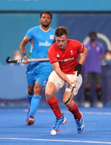 Zachary Wallace of Team Great Britain controls the ball during the Men's Quarterfinal match between India and Great Britain on day nine of the Tokyo...