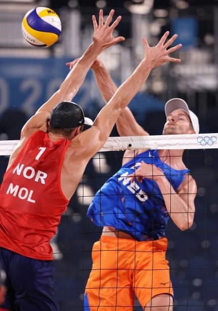 Anders Berntsen Mol of Team Norway competes against Robert Meeuwsen of Team Netherlands during the Men's Round of 16 beach volleyball on day nine of...