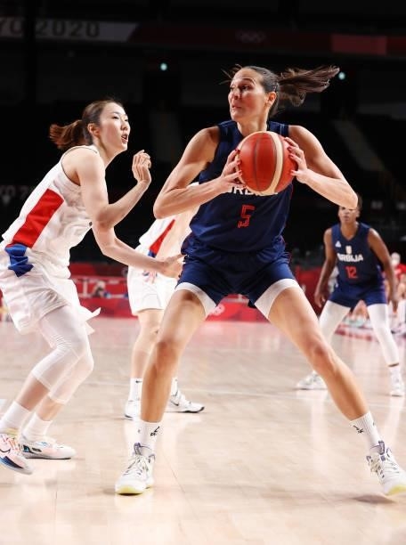 Sonja Vasic of Team Serbia drives to the basket against Hyejin Park of Team South Korea during the second half of a Women's Basketball Preliminary...