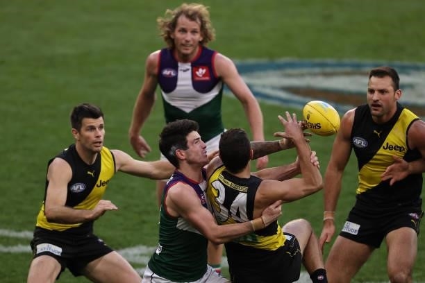 Andrew Brayshaw of the Dockers tackles Jack Graham of the Tigers during the round 20 AFL match between Fremantle Dockers and Richmond Tigers at Optus...
