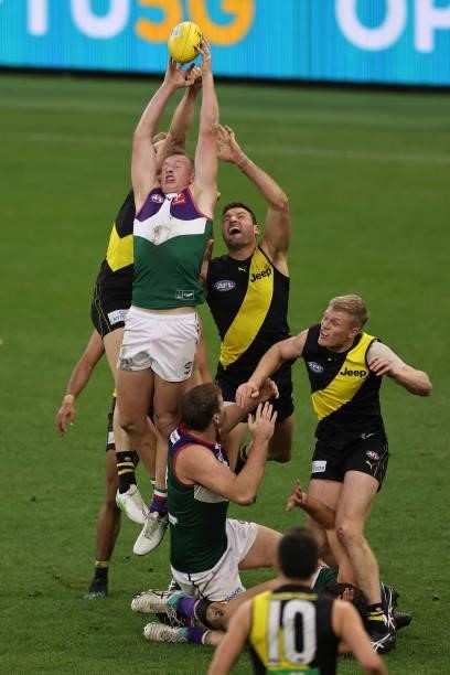 Josh Treacy of the Dockers contests for a mark during the round 20 AFL match between Fremantle Dockers and Richmond Tigers at Optus Stadium on August...