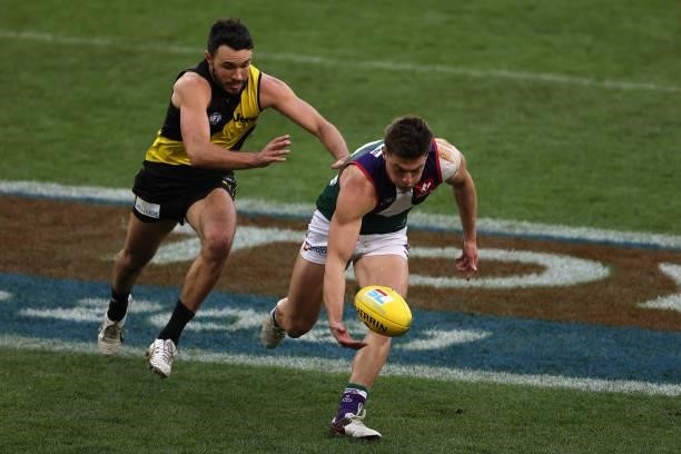 Darcy Tucker of the Dockers runs onto the ball during the round 20 AFL match between Fremantle Dockers and Richmond Tigers at Optus Stadium on August...