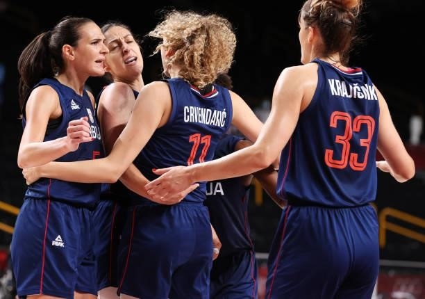 Sonja Vasic of Team Serbia celebrates with her teammates during the second half of their Women's Basketball Preliminary Round Group A game against...